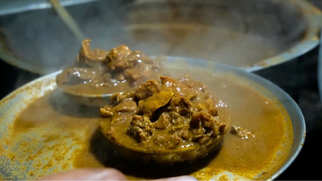 Serving Beef Curry at Thangalikkante Kada