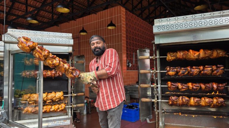 Posing with Shawaya Chickens at T&T Shawaya Kochi